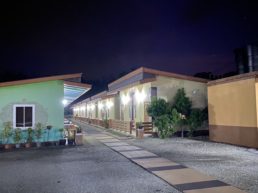 Illuminated guest room buildings at dusk